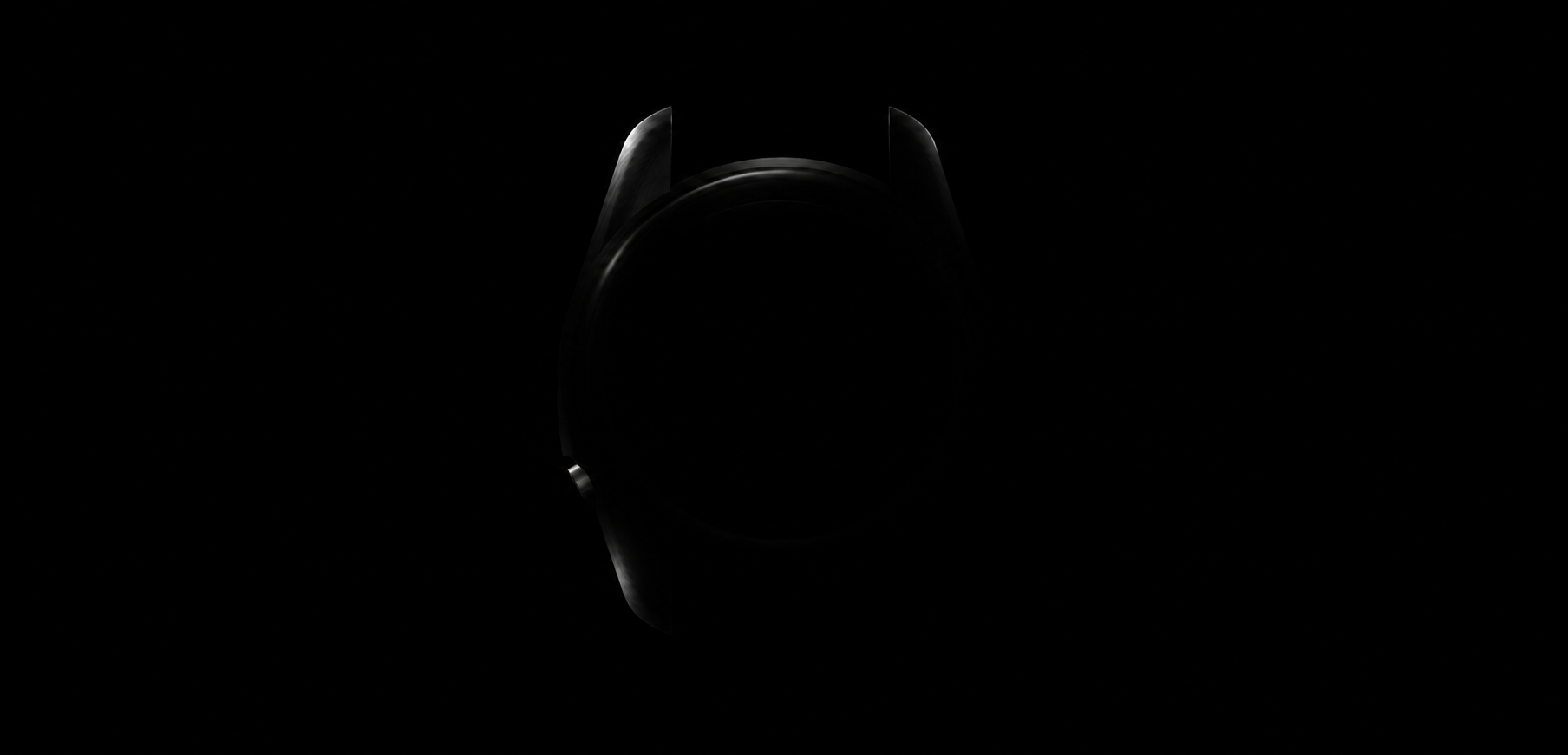 Doku–1 viewed from the front, with a dark crystal and softly lit case contours.
